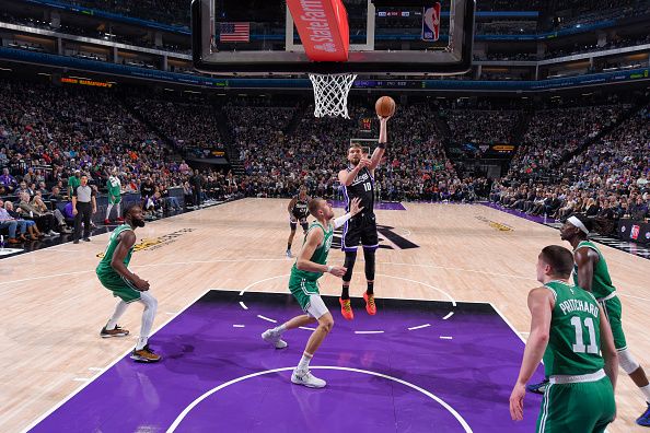 SACRAMENTO, CA - DECEMBER 20:  Domantas Sabonis #10 of the Sacramento Kings goes to the basket during the game on December 20, 2023 at Golden 1 Center in Sacramento, California. NOTE TO USER: User expressly acknowledges and agrees that, by downloading and or using this Photograph, user is consenting to the terms and conditions of the Getty Images License Agreement. Mandatory Copyright Notice: Copyright 2023 NBAE (Photo by Rocky Widner/NBAE via Getty Images)