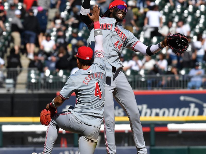 Apr 13, 2024; Chicago, Illinois, USA; Cincinnati Reds shortstop Elly De La Cruz (44) celebrates with second baseman Santiago Espinal (4) after defeating the Chicago White Sox at Guaranteed Rate Field. Mandatory Credit: Patrick Gorski-USA TODAY Sports