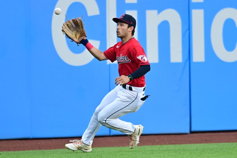 Aug 22, 2023; Cleveland, Ohio, USA; Cleveland Guardians left fielder Steven Kwan (38) fields a ball hit by Los Angeles Dodgers second baseman Mookie Betts (not pictured) during the first inning at Progressive Field. Mandatory Credit: Ken Blaze-USA TODAY Sports