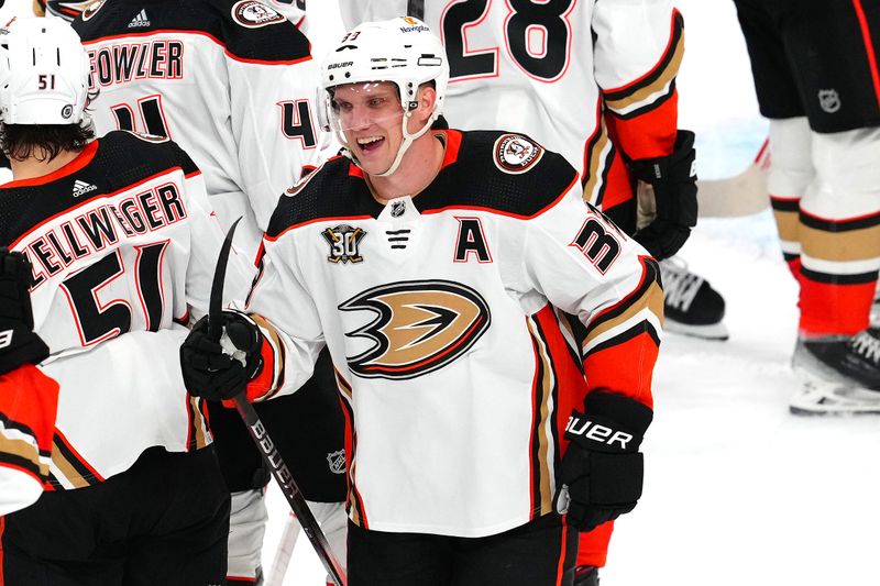 Apr 18, 2024; Las Vegas, Nevada, USA; Anaheim Ducks right wing Jakob Silfverberg (33) celebrates with team mates after the Ducks defeated the Vegas Golden Knights 4-1 at T-Mobile Arena. Mandatory Credit: Stephen R. Sylvanie-USA TODAY Sports