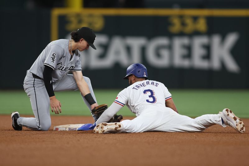 Jul 25, 2024; Arlington, Texas, USA; Texas Rangers center fielder Leody Taveras (3) is caught stealing second base against Chicago White Sox second base Brooks Baldwin (27) at Globe Life Field. Mandatory Credit: Tim Heitman-USA TODAY Sports