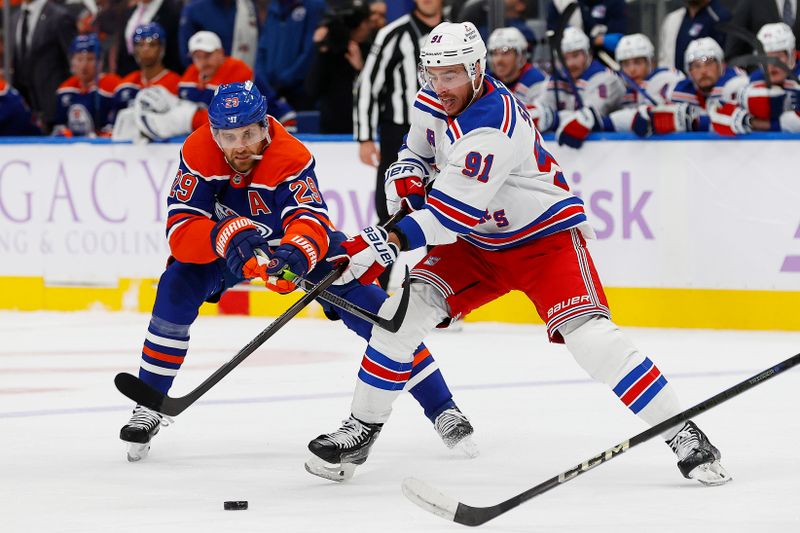 Nov 23, 2024; Edmonton, Alberta, CAN; Edmonton Oilers forward Leon Draisaitl (29) tries to knock the puck away from New York Rangers forward Reilly Smith (91) during the second period at Rogers Place. Mandatory Credit: Perry Nelson-Imagn Images