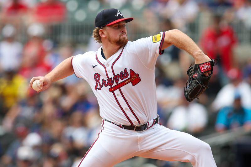 Sep 30, 2024; Atlanta, Georgia, USA; Atlanta Braves starting pitcher Spencer Schwellenbach (56) throws against the New York Mets in the second inning at Truist Park. Mandatory Credit: Brett Davis-Imagn Images
