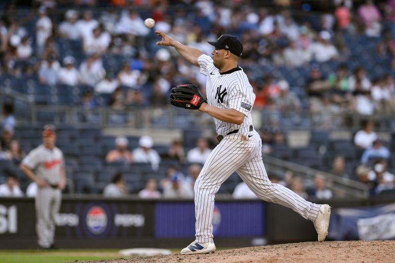 Jun 20, 2024; Bronx, New York, USA; New York Yankees catcher Jose Trevino (39) pitches against the Baltimore Orioles during the ninth inning at Yankee Stadium. Mandatory Credit: John Jones-USA TODAY Sports