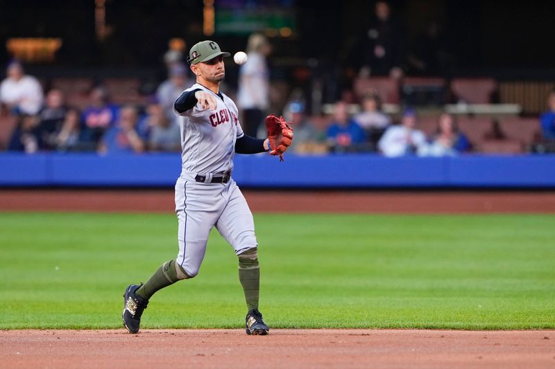 May 21, 2023; New York City, New York, USA; Cleveland Guardians second baseman Andres Gimenez (0) throws out New York Mets center fielder Brandon Nimmo (9) (not pictured) after fielding a ground ball during the first inning at Citi Field. Mandatory Credit: Gregory Fisher-USA TODAY Sports