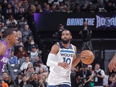 SACRAMENTO, CA - DECEMBER 23: Mike Conley #10 of the Minnesota Timberwolves brings the ball up court against the Sacramento Kings on December 23, 2023 at Golden 1 Center in Sacramento, California. NOTE TO USER: User expressly acknowledges and agrees that, by downloading and or using this Photograph, user is consenting to the terms and conditions of the Getty Images License Agreement. Mandatory Copyright Notice: Copyright 2023 NBAE (Photo by Rocky Widner/NBAE via Getty Images)