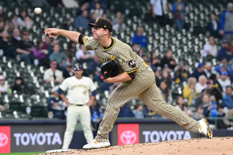 Apr 17, 2024; Milwaukee, Wisconsin, USA; San Diego Padres pitcher Michael King (34) throws a pitch in the fourth inning against the Milwaukee Brewers at American Family Field. Mandatory Credit: Benny Sieu-USA TODAY Sports