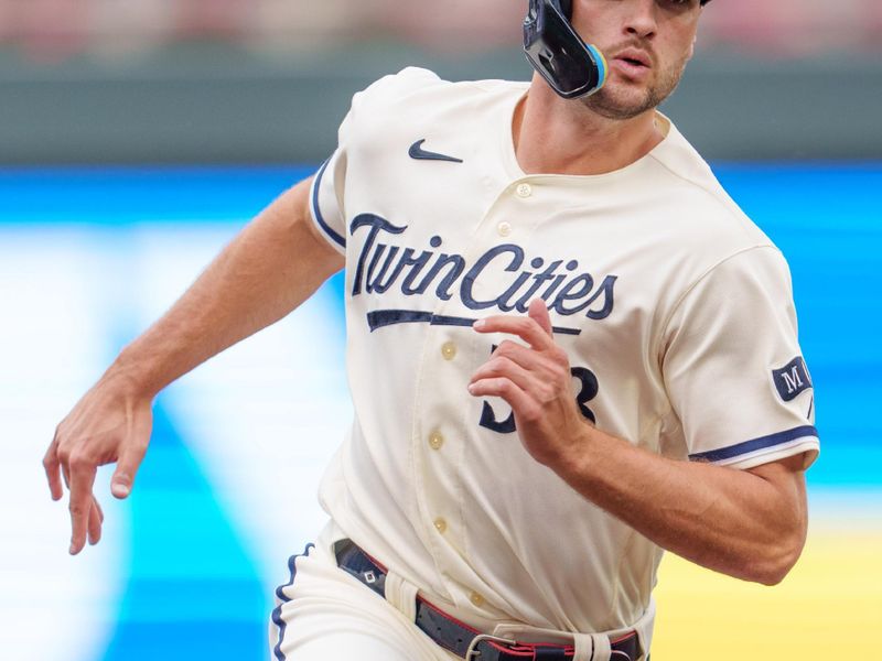 Sep 24, 2023; Minneapolis, Minnesota, USA; Minnesota Twins designated hitter Matt Wallner (38) runs to third base and then home on a single by shortstop Kyle Farmer (12) in the seventh inning against the Los Angeles Angels. Mandatory Credit: Matt Blewett-USA TODAY Sports