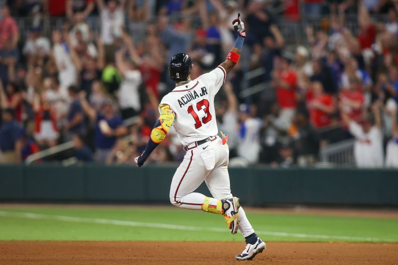 Sep 26, 2023; Atlanta, Georgia, USA; Atlanta Braves right fielder Ronald Acuna Jr. (13) reacts after a home run against the Chicago Cubs in the seventh inning at Truist Park. Mandatory Credit: Brett Davis-USA TODAY Sports
