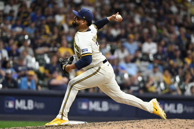 Oct 3, 2023; Milwaukee, Wisconsin, USA; Milwaukee Brewers relief pitcher Joel Payamps (31) pitches in the seventh inning against the Arizona Diamondbacks during game one of the Wildcard series for the 2023 MLB playoffs at American Family Field. Mandatory Credit: Michael McLoone-USA TODAY Sports