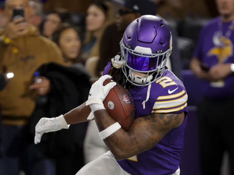 Minnesota Vikings running back Alexander Mattison (2) warms up before an NFL football game against the Chicago Bears, Monday, Nov. 27, 2023, in Minneapolis. (AP Photo/Bruce Kluckhohn)