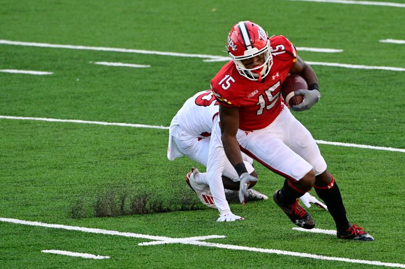 Dec 12, 2020; College Park, Maryland, USA; Maryland Terrapins wide receiver Brian Cobbs (15) runs for a second half touchdown against the Rutgers Scarlet Knights  at Capital One Field at Maryland Stadium. Mandatory Credit: Tommy Gilligan-USA TODAY Sports