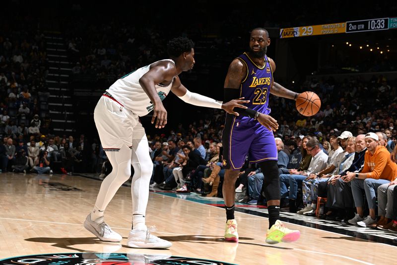 MEMPHIS, TN - NOVEMBER 6: LeBron James #23 of the Los Angeles Lakers handles the ball during the game against the Memphis Grizzlies on November 6, 2024 at FedExForum in Memphis, Tennessee. NOTE TO USER: User expressly acknowledges and agrees that, by downloading and or using this photograph, User is consenting to the terms and conditions of the Getty Images License Agreement. Mandatory Copyright Notice: Copyright 2024 NBAE (Photo by Grant Burke/NBAE via Getty Images)