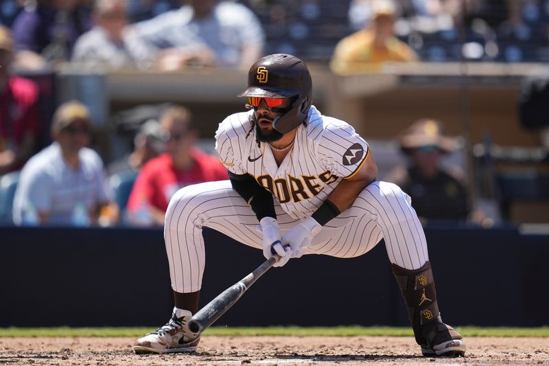 Aug 23, 2023; San Diego, California, USA;  San Diego Padres right fielder Fernando Tatis Jr. (23) reacts after a called third strike during the third inning against the Miami Marlins at Petco Park. Mandatory Credit: Ray Acevedo-USA TODAY Sports