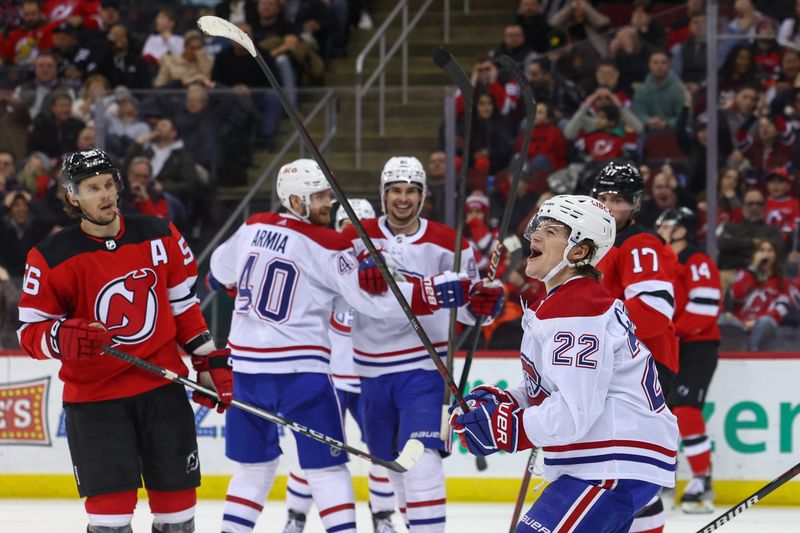 Jan 17, 2024; Newark, New Jersey, USA; Montreal Canadiens right wing Cole Caufield (22) celebrates his goal against the New Jersey Devils during the third period at Prudential Center. Mandatory Credit: Ed Mulholland-USA TODAY Sports