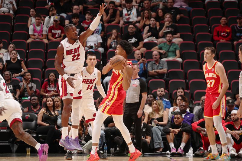 MIAMI, FL - OCTOBER 16: Jimmy Butler #22 of the Miami Heat defends at the game against the Atlanta Hawks on October 16, 2024 at Miami-Dade Arena in Miami, Florida. NOTE TO USER: User expressly acknowledges and agrees that, by downloading and or using this Photograph, user is consenting to the terms and conditions of the Getty Images License Agreement. Mandatory Copyright Notice: Copyright 2024 NBAE (Photo by Issac Baldizon/NBAE via Getty Images)