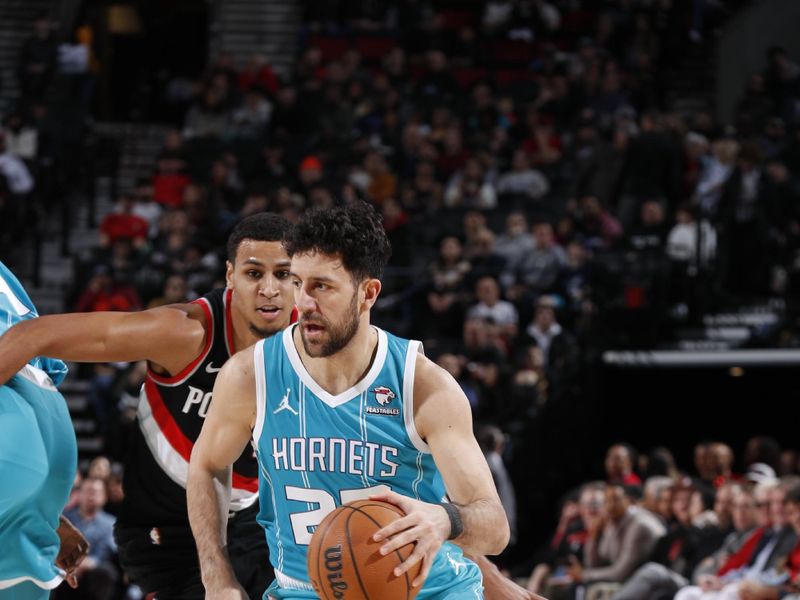 PORTLAND, OR - FEBRUARY 25:  Vasilije Micic #22 of the Charlotte Hornets goes to the basket during the game on February 25, 2024 at the Moda Center Arena in Portland, Oregon. NOTE TO USER: User expressly acknowledges and agrees that, by downloading and or using this photograph, user is consenting to the terms and conditions of the Getty Images License Agreement. Mandatory Copyright Notice: Copyright 2024 NBAE (Photo by Cameron Browne/NBAE via Getty Images)