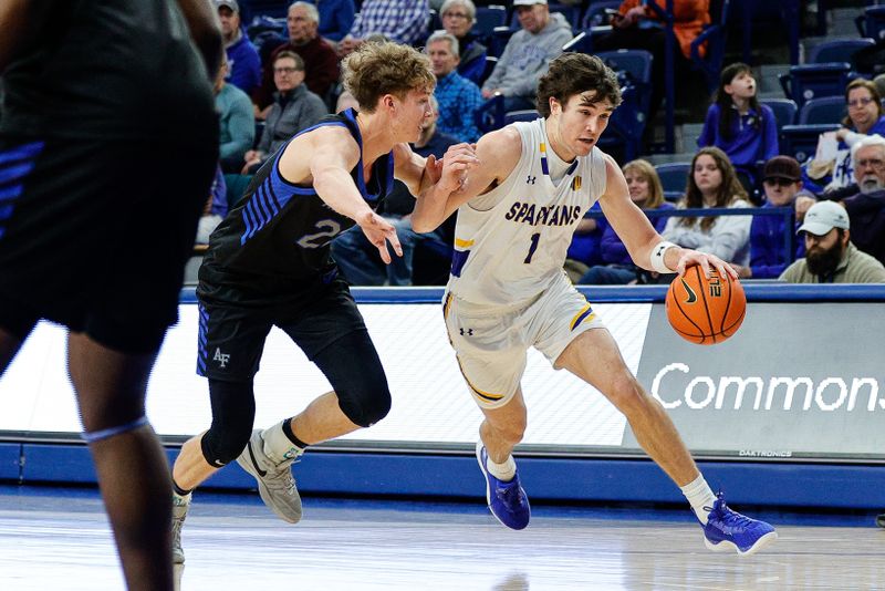 Jan 13, 2024; Colorado Springs, Colorado, USA; San Jose State Spartans guard Garrett Anderson (1) controls the ball under pressure from Air Force Falcons guard Kellan Boylan (23) in the first half at Clune Arena. Mandatory Credit: Isaiah J. Downing-USA TODAY Sports