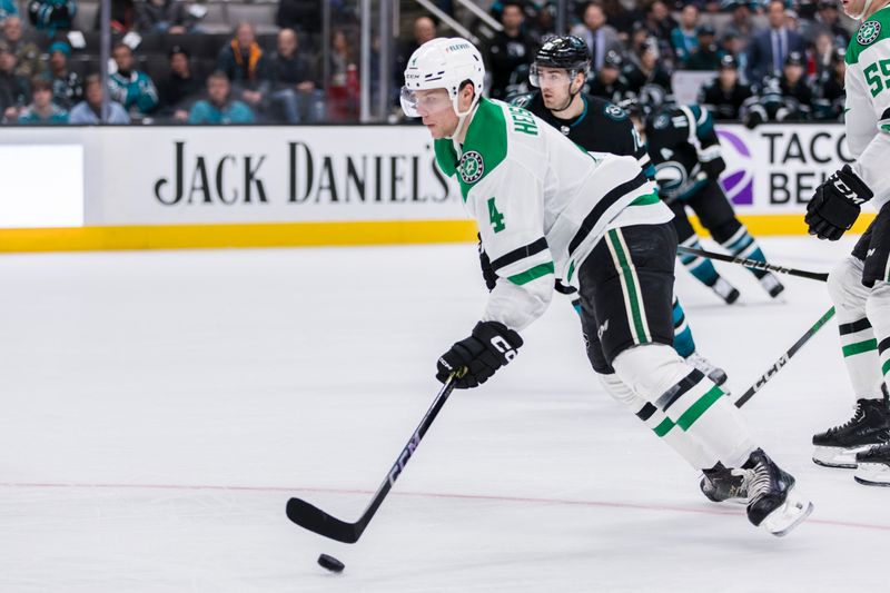 Mar 5, 2024; San Jose, California, USA; Dallas Stars defenseman Miro Heiskanen (4) looks to pass against the San Jose Sharks during the first period at SAP Center at San Jose. Mandatory Credit: John Hefti-USA TODAY Sports