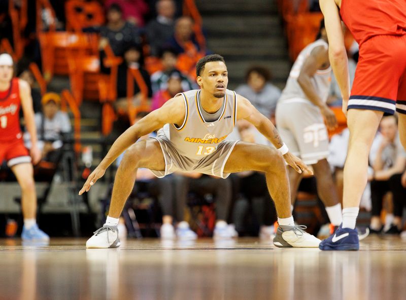 Feb 3, 2024; El Paso, Texas, USA; UTEP Miners forward Calvin Solomon (13) plays defense against the Liberty University Flames in the second half at Don Haskins Center. Mandatory Credit: Ivan Pierre Aguirre-USA TODAY Sports