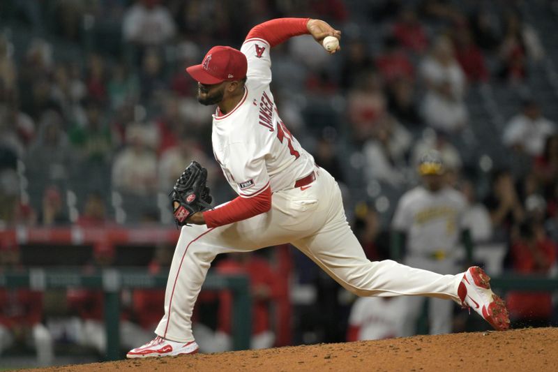 Jun 9, 2025; Anaheim, California, USA;   Los Angeles Angels relief pitcher Kenley Jansen (74) earns his 15th save of the season in the ninth inning against the Athletics at Angel Stadium. Mandatory Credit: Jayne Kamin-Oncea-Imagn Images