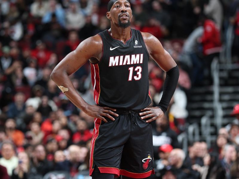 CHICAGO, IL - FEBRUARY 4:  Bam Adebayo #13 of the Miami Heat looks on during the game against the Chicago Bulls on February 4 2025 at United Center in Chicago, Illinois. NOTE TO USER: User expressly acknowledges and agrees that, by downloading and or using this photograph, User is consenting to the terms and conditions of the Getty Images License Agreement. Mandatory Copyright Notice: Copyright 2025 NBAE (Photo by Jeff Haynes/NBAE via Getty Images)