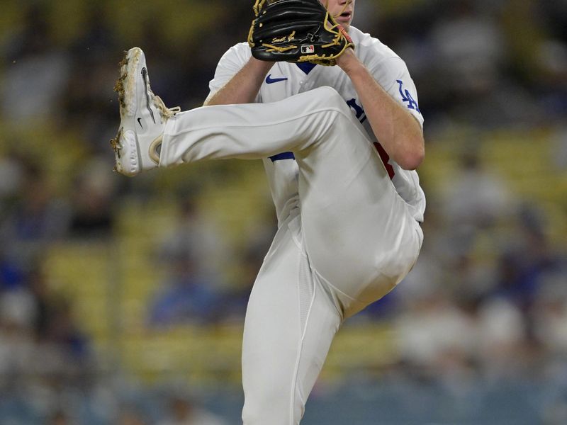 Aug 16, 2023; Los Angeles, California, USA;  Los Angeles Dodgers relief pitcher Gus Varland (58) threw a scoreless 8th and 9th inning against the Milwaukee Brewers at Dodger Stadium. Mandatory Credit: Jayne Kamin-Oncea-USA TODAY Sports