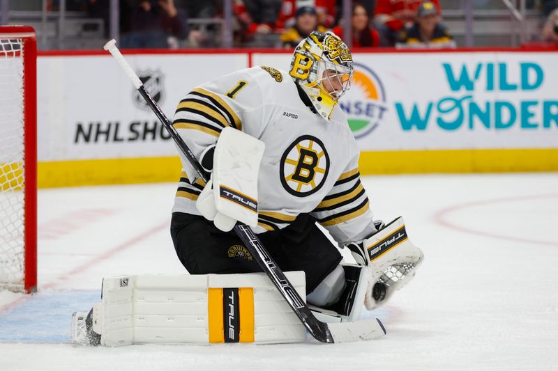 Dec 31, 2023; Detroit, Michigan, USA; Boston Bruins goaltender Jeremy Swayman (1) makes a glove save during the second period of the game between the Boston Bruins and the Detroit Red Wings at Little Caesars Arena. Mandatory Credit: Brian Bradshaw Sevald-USA TODAY Sports