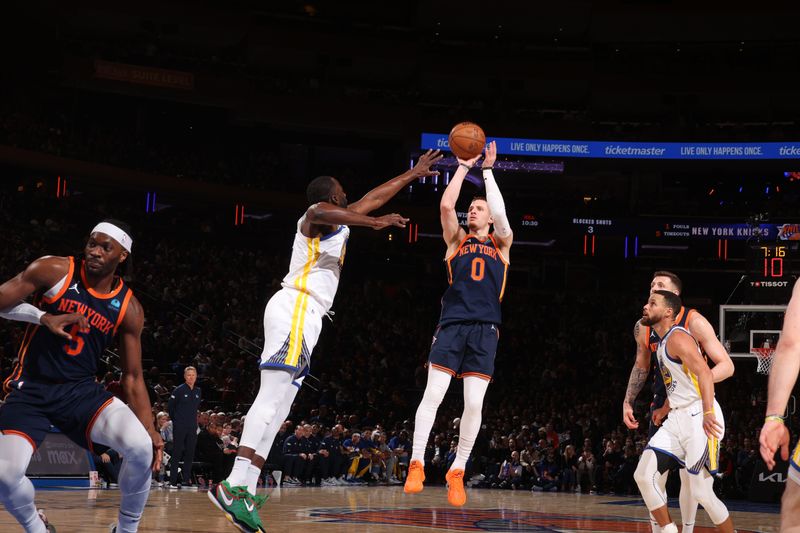 NEW YORK, NY - FEBRUARY 29: Donte Divincenzo #0 of the New York Knicks shoots a three point basket against the Golden State Warriors on January 29, 2024 at Madison Square Garden in New York City, New York.  NOTE TO USER: User expressly acknowledges and agrees that, by downloading and or using this photograph, User is consenting to the terms and conditions of the Getty Images License Agreement. Mandatory Copyright Notice: Copyright 2024 NBAE  (Photo by Nathaniel S. Butler/NBAE via Getty Images)