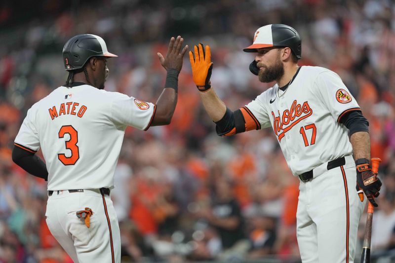 Apr 30, 2024; Baltimore, Maryland, USA; Baltimore Orioles second baseman Jorge Mateo (3) greeted by outfielder Colton Cowser (17) after scoring in the fourth inning on a double by catcher James McCann (not shown) against the New York Yankees at Oriole Park at Camden Yards. Mandatory Credit: Mitch Stringer-USA TODAY Sports