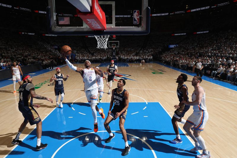 OKLAHOMA CITY, OK - APRIL 21:  Shai Gilgeous-Alexander #2 of the Oklahoma City Thunder goes to the basket during the game against the New Orleans Pelicans during Round 1 Game 1 of the 2024 NBA Playoffs on April 21, 2024 at Paycom Arena in Oklahoma City, Oklahoma. NOTE TO USER: User expressly acknowledges and agrees that, by downloading and or using this photograph, User is consenting to the terms and conditions of the Getty Images License Agreement. Mandatory Copyright Notice: Copyright 2024 NBAE (Photo by Zach Beeker/NBAE via Getty Images)