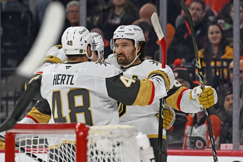 Dec 11, 2025; Philadelphia, Pennsylvania, USA; Vegas Golden Knights right wing Mark Stone (61) celebrates his goal with center Tomas Hertl (48) against the Philadelphia Flyers during the second period at Xfinity Mobile Arena. Mandatory Credit: Eric Hartline-Imagn Images