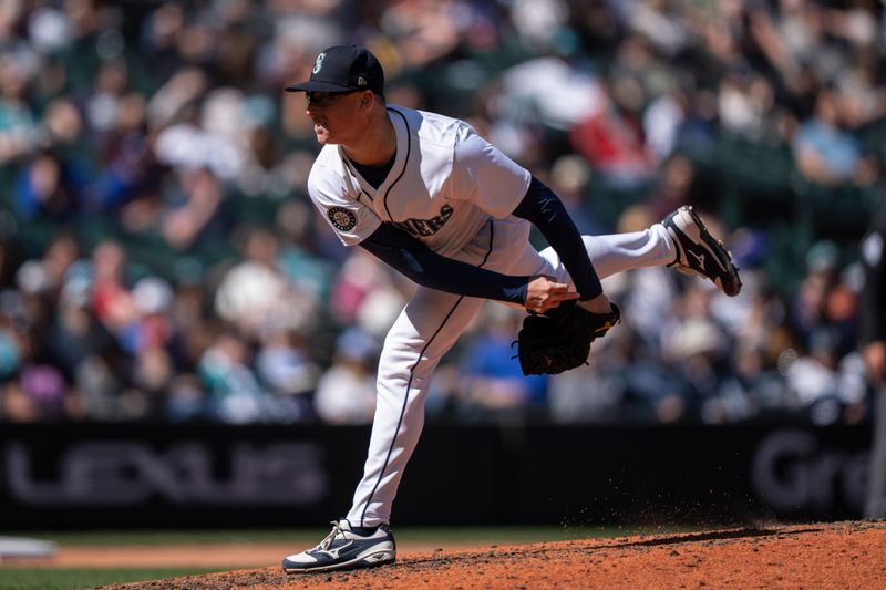 Apr 17, 2024; Seattle, Washington, USA; Seattle Mariners reliever Trent Thornton (46) delivers a pitch during the seventh inning at T-Mobile Park. Mandatory Credit: Stephen Brashear-USA TODAY Sports