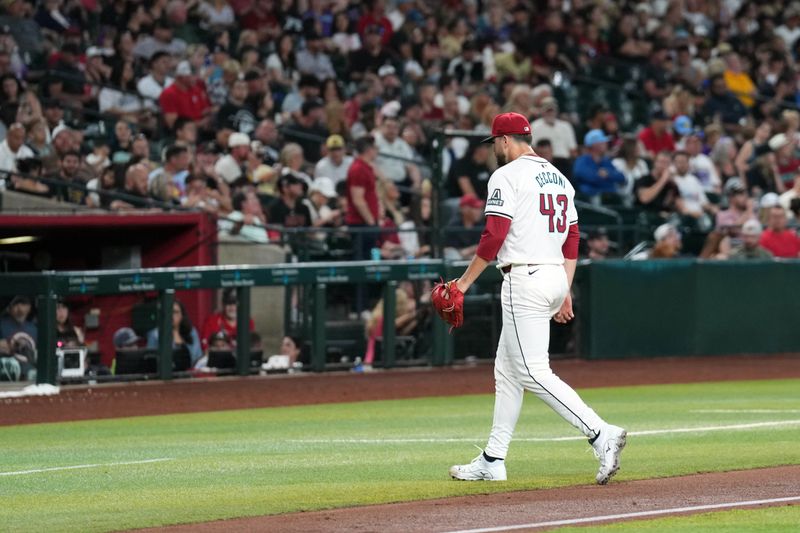 May 3, 2024; Phoenix, Arizona, USA; Arizona Diamondbacks pitcher Slade Cecconi (43) leaves the game against the San Diego Padres during the fifth inning at Chase Field. Mandatory Credit: Joe Camporeale-USA TODAY Sports