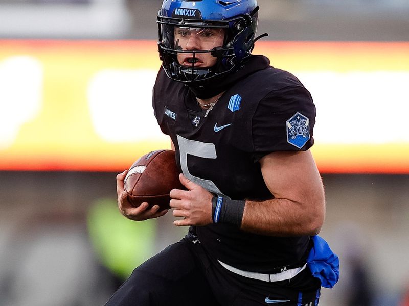 Nov 12, 2022; Colorado Springs, Colorado, USA; Air Force Falcons quarterback Jensen Jones (5) runs the ball in the fourth quarter against the New Mexico Lobos at Falcon Stadium. Mandatory Credit: Isaiah J. Downing-USA TODAY Sports