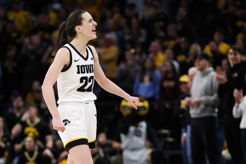 Mar 5, 2023; Minneapolis, MINN, USA; Iowa Hawkeyes guard Caitlin Clark (22) celebrates during the second half against the Ohio State Buckeyes at Target Center. Mandatory Credit: Matt Krohn-USA TODAY Sports