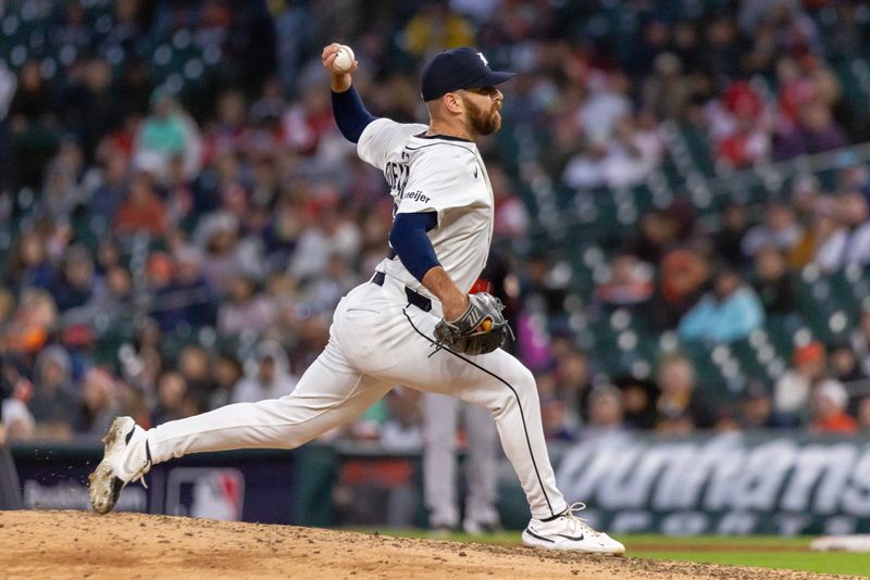 Apr 26, 2025; Detroit, Michigan, USA; Detroit Tigers pitcher Sean Guenther (73) delivers in the seventh inning during game two of a double header against the Baltimore Orioles at Comerica Park. Mandatory Credit: David Reginek-Imagn Images
