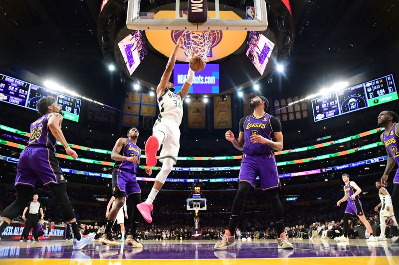 LOS ANGELES, CA - MARCH 8: Giannis Antetokounmpo #34 of the Milwaukee Bucks dunks the ball during the game against the Los Angeles Lakers on March 8, 2024 at Crypto.Com Arena in Los Angeles, California. NOTE TO USER: User expressly acknowledges and agrees that, by downloading and/or using this Photograph, user is consenting to the terms and conditions of the Getty Images License Agreement. Mandatory Copyright Notice: Copyright 2024 NBAE (Photo by Adam Pantozzi/NBAE via Getty Images)