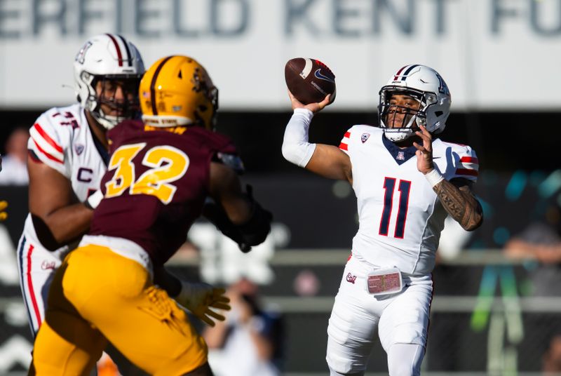 Nov 25, 2023; Tempe, Arizona, USA; Arizona Wildcats quarterback Noah Fifita (11) against the Arizona State Sun Devils in the first half of the Territorial Cup at Mountain America Stadium. Mandatory Credit: Mark J. Rebilas-USA TODAY Sports