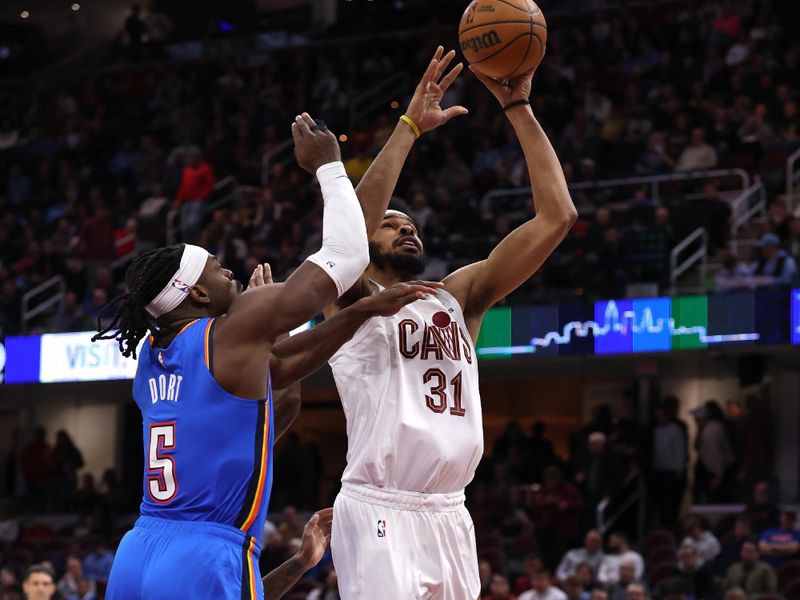 CLEVELAND, OH - JANUARY 8: Jarrett Allen #31 of the Cleveland Cavaliers drives to the basket during the game against the Oklahoma City Thunder on January 8, 2025 at Rocket Mortgage FieldHouse in Cleveland, Ohio. NOTE TO USER: User expressly acknowledges and agrees that, by downloading and/or using this Photograph, user is consenting to the terms and conditions of the Getty Images License Agreement. Mandatory Copyright Notice: Copyright 2025 NBAE (Photo by  Lauren Leigh Bacho/NBAE via Getty Images)