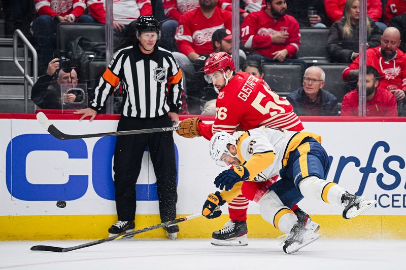 Nov 26, 2025; Detroit, Michigan, USA; Detroit Red Wings defenseman Erik Gustafsson (56) and Nashville Predators left wing Michael Bunting (58) battle for the puck during the first period at Little Caesars Arena. Mandatory Credit: Tim Fuller-Imagn Images