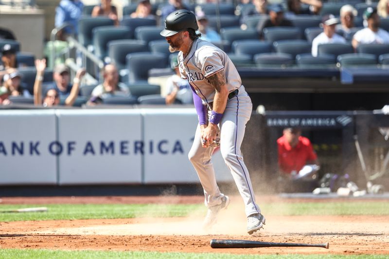 Aug 24, 2024; Bronx, New York, USA;  Colorado Rockies right fielder Jake Cave (11) scores a run in the third inning against the Colorado Rockies at Yankee Stadium. Mandatory Credit: Wendell Cruz-USA TODAY Sports