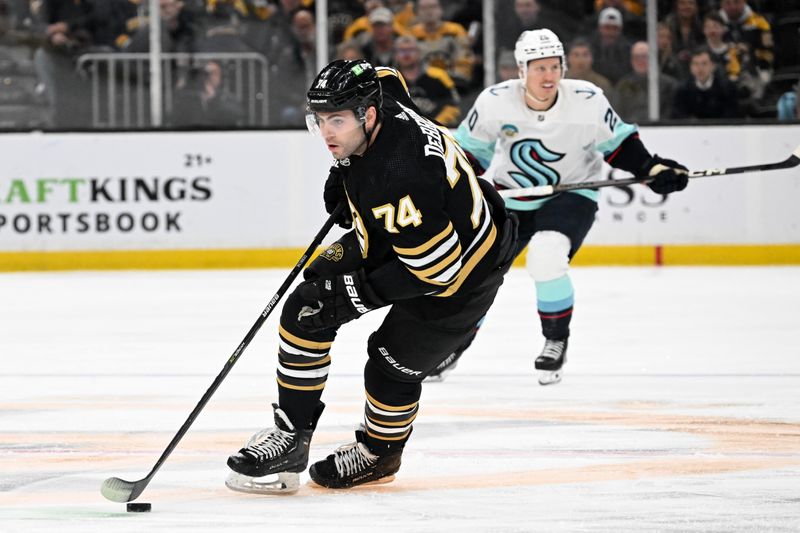 Feb 15, 2024; Boston, Massachusetts, USA; Boston Bruins left-wing Jake DeBrusk (74) skates against the Seattle Kraken during the first period at TD Garden. Mandatory Credit: Brian Fluharty-USA TODAY Sports