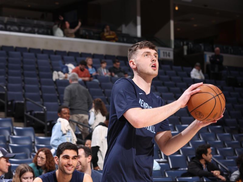 MEMPHIS, TN - JANUARY 29:  Matthew Hurt #20 of the Memphis Grizzles warms up before the game against the Sacramento Kings on January 29, 2024 at FedExForum in Memphis, Tennessee. NOTE TO USER: User expressly acknowledges and agrees that, by downloading and or using this photograph, User is consenting to the terms and conditions of the Getty Images License Agreement. Mandatory Copyright Notice: Copyright 2024 NBAE (Photo by Joe Murphy/NBAE via Getty Images)