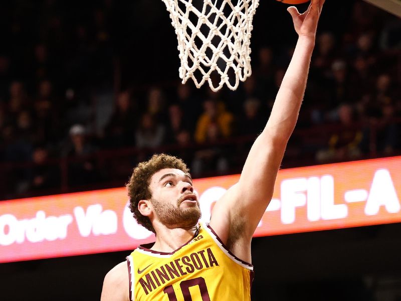 Dec 8, 2022; Minneapolis, Minnesota, USA; Minnesota Golden Gophers forward Jamison Battle (10) shoots against the Michigan Wolverines during the first half at Williams Arena. Mandatory Credit: Matt Krohn-USA TODAY Sports