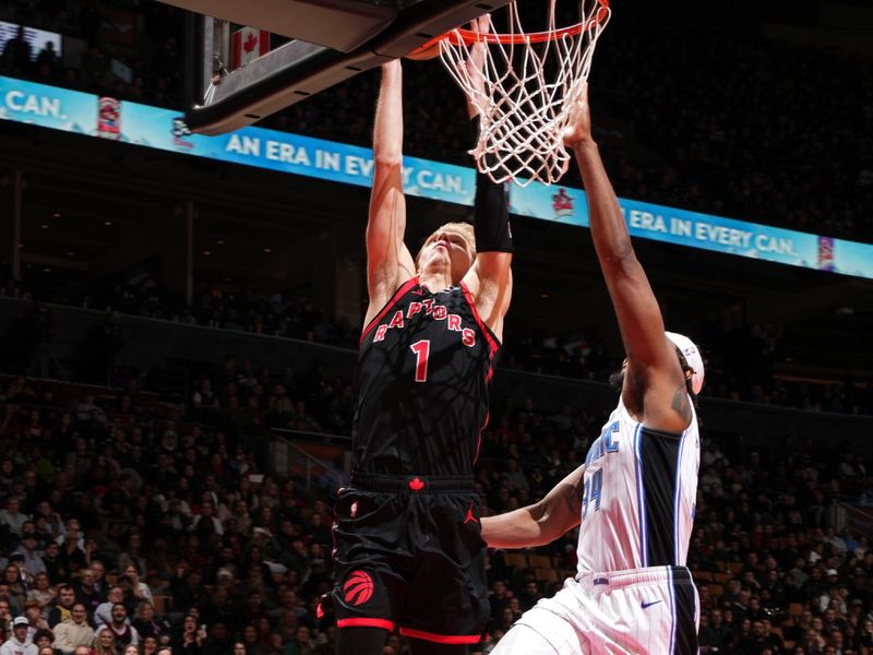 TORONTO, CANADA - JANUARY 3: Gradey Dick #1 of the Toronto Raptors drives to the basket during the game against the Orlando Magic on January 3, 2025 at the Scotiabank Arena in Toronto, Ontario, Canada.  NOTE TO USER: User expressly acknowledges and agrees that, by downloading and or using this Photograph, user is consenting to the terms and conditions of the Getty Images License Agreement.  Mandatory Copyright Notice: Copyright 2025 NBAE(Photo by Mark Blinch/NBAE via Getty Images)