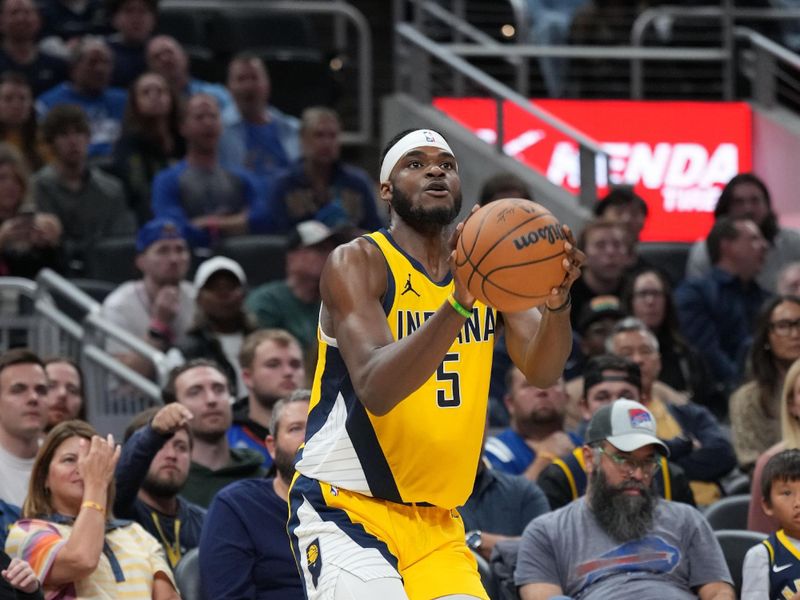 INDIANAPOLIS, IN - NOVEMBER 10: Jarace Walker #5 of the Indiana Pacers shoots a three point basket during the game against the New York Knicks on November 10, 2024 at Gainbridge Fieldhouse in Indianapolis, Indiana. NOTE TO USER: User expressly acknowledges and agrees that, by downloading and or using this Photograph, user is consenting to the terms and conditions of the Getty Images License Agreement. Mandatory Copyright Notice: Copyright 2024 NBAE (Photo by A.J. Mast/NBAE via Getty Images)