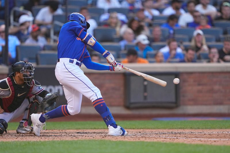 Sep 14, 2023; New York City, New York, USA; New York Mets center fielder Brandon Nimmo (9) hits a single against the Arizona Diamondbacks during the fifth inning at Citi Field. Mandatory Credit: Gregory Fisher-USA TODAY Sports