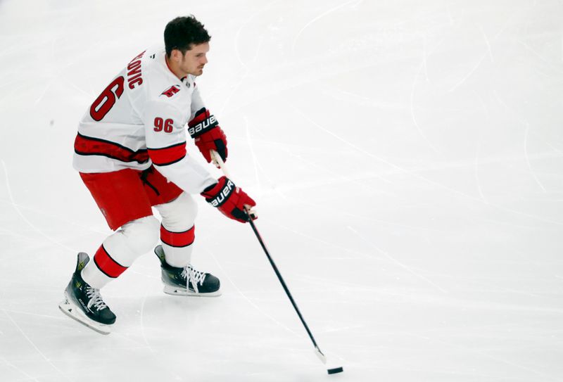 Oct 18, 2024; Pittsburgh, Pennsylvania, USA;  Carolina Hurricanes center Jack Roslovic (96) warms up against the Pittsburgh Penguins at PPG Paints Arena. Mandatory Credit: Charles LeClaire-Imagn Images