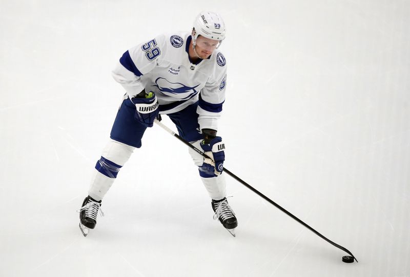 Nov 19, 2024; Pittsburgh, Pennsylvania, USA; Tampa Bay Lightning center Jake Guentzel (59) warms up before the game against the Pittsburgh Penguins at PPG Paints Arena. Mandatory Credit: Charles LeClaire-Imagn Images